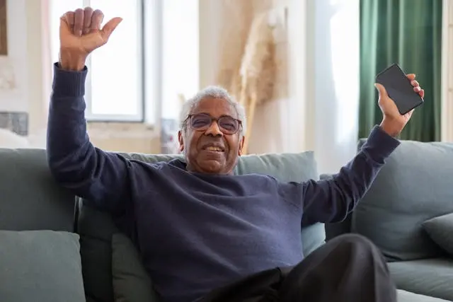 Senior person smiling and looking content